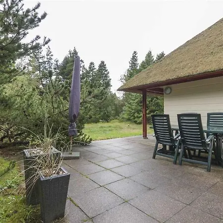 With Thatched Roof And Calm Villa